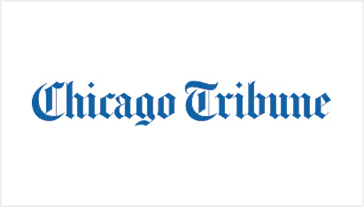 Chicago Tribune logo in blue Old English font on a white background.